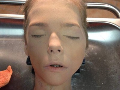 Young blonde female in morgue